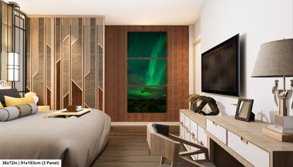 a modern bedroom with a large bed, a wooden dresser, and a large window with a view of the night sky. The room has a minimalist and contemporary design, with a large wall art piece featuring a green and blue color scheme.