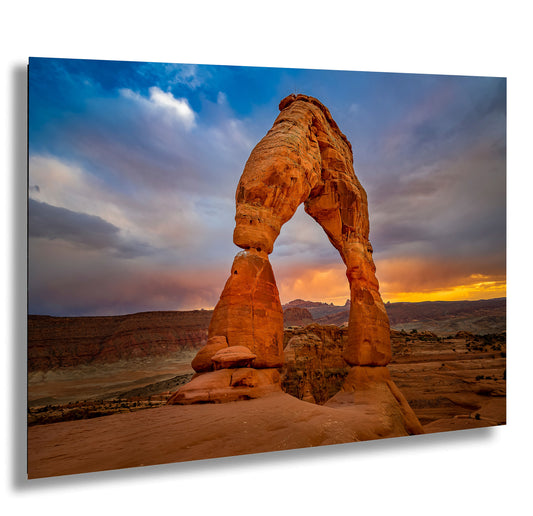 a large rock formation in the middle of a desert
