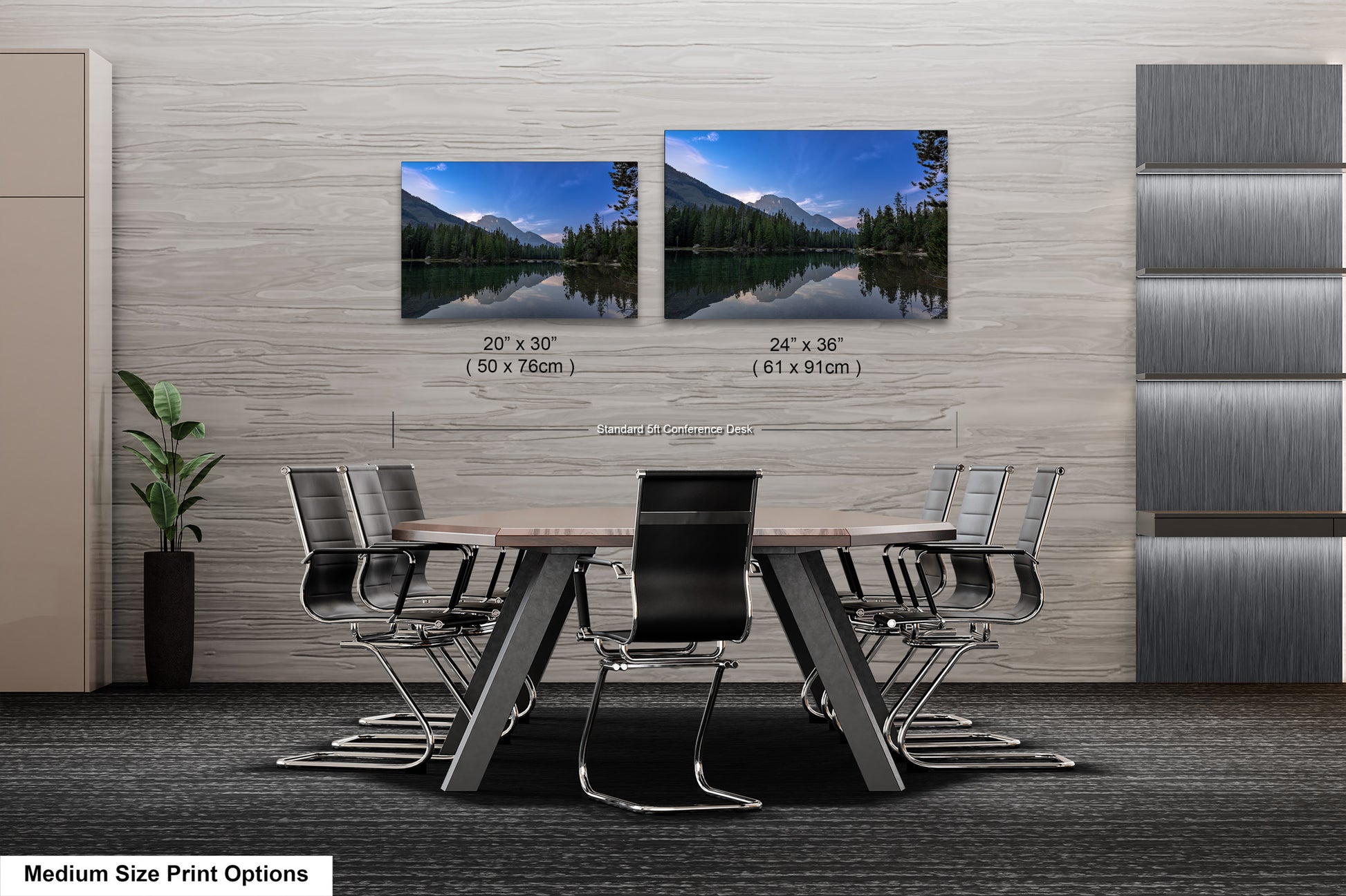 a dining room table with chairs and two pictures of mountains on the wall