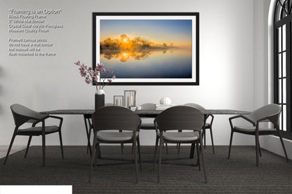 a picture of a dining room with a table and chairs