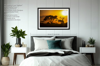 a bedroom with a bed and a picture on the wall