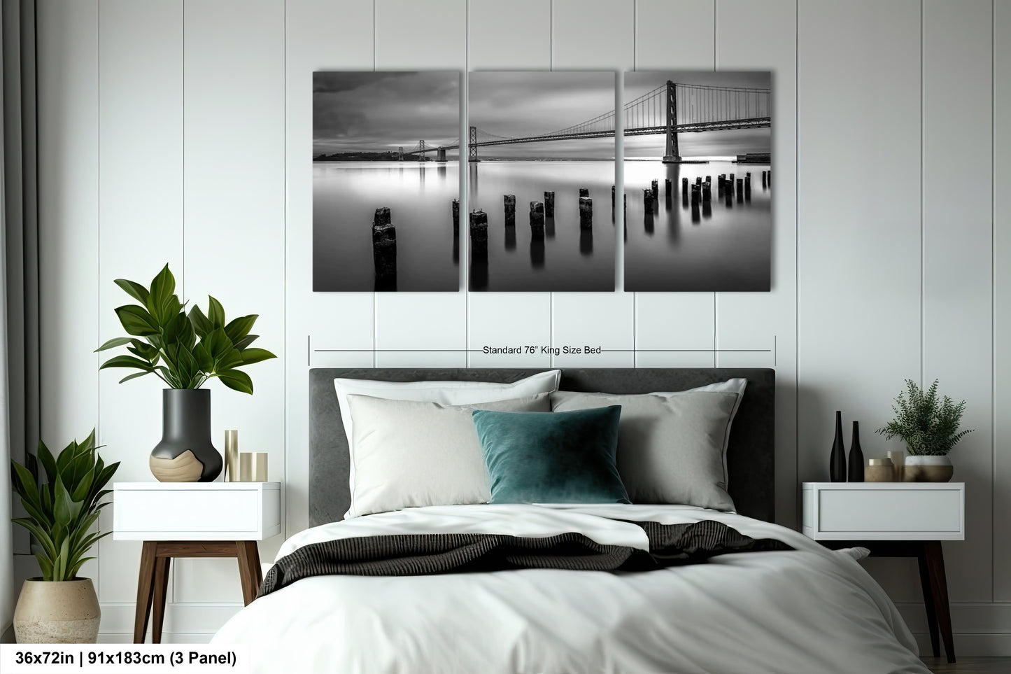 a black and white photo of a bed with a bridge in the background