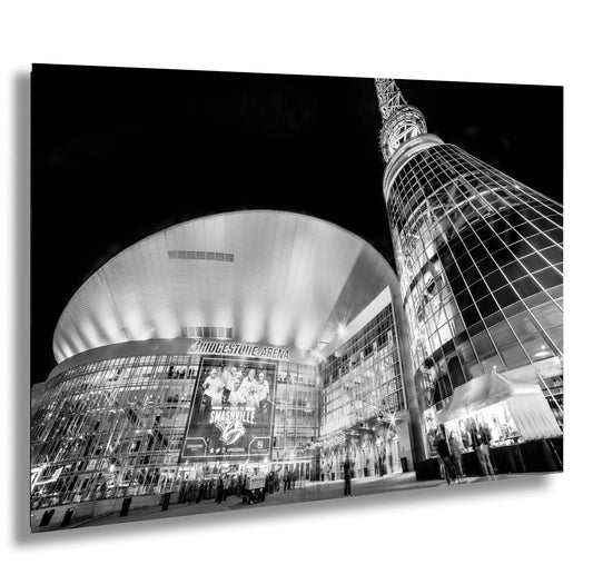 a black and white photo of a building at night