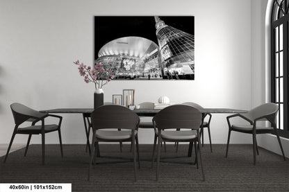 a black and white photo of a dining room
