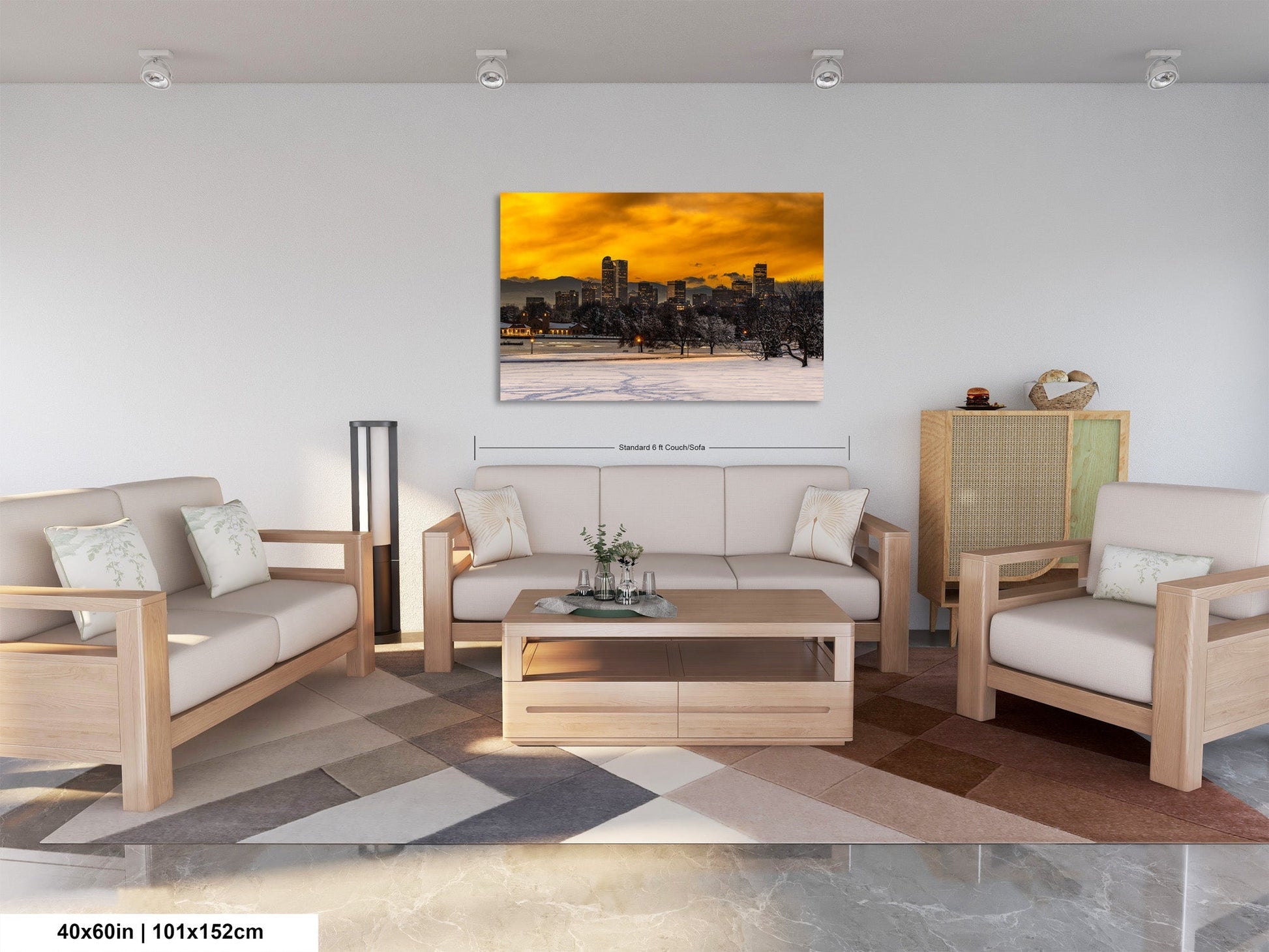 a living room filled with furniture and a painting on the wall