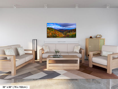 a living room filled with furniture and a painting on the wall