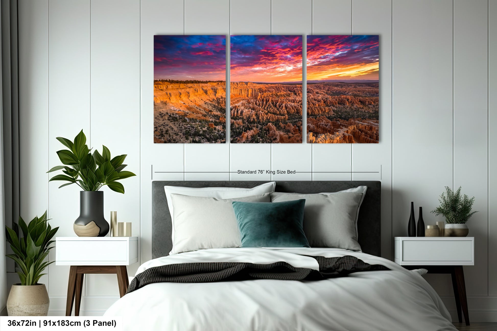 a bed room with a neatly made bed and two paintings on the wall