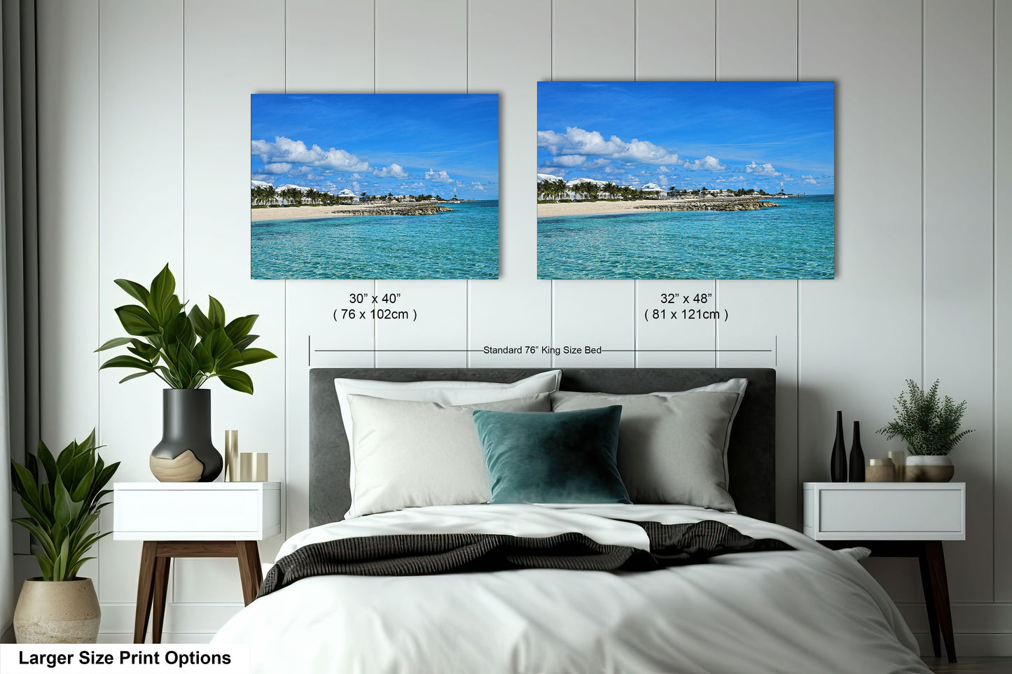 a bedroom with a bed and two pictures on the wall