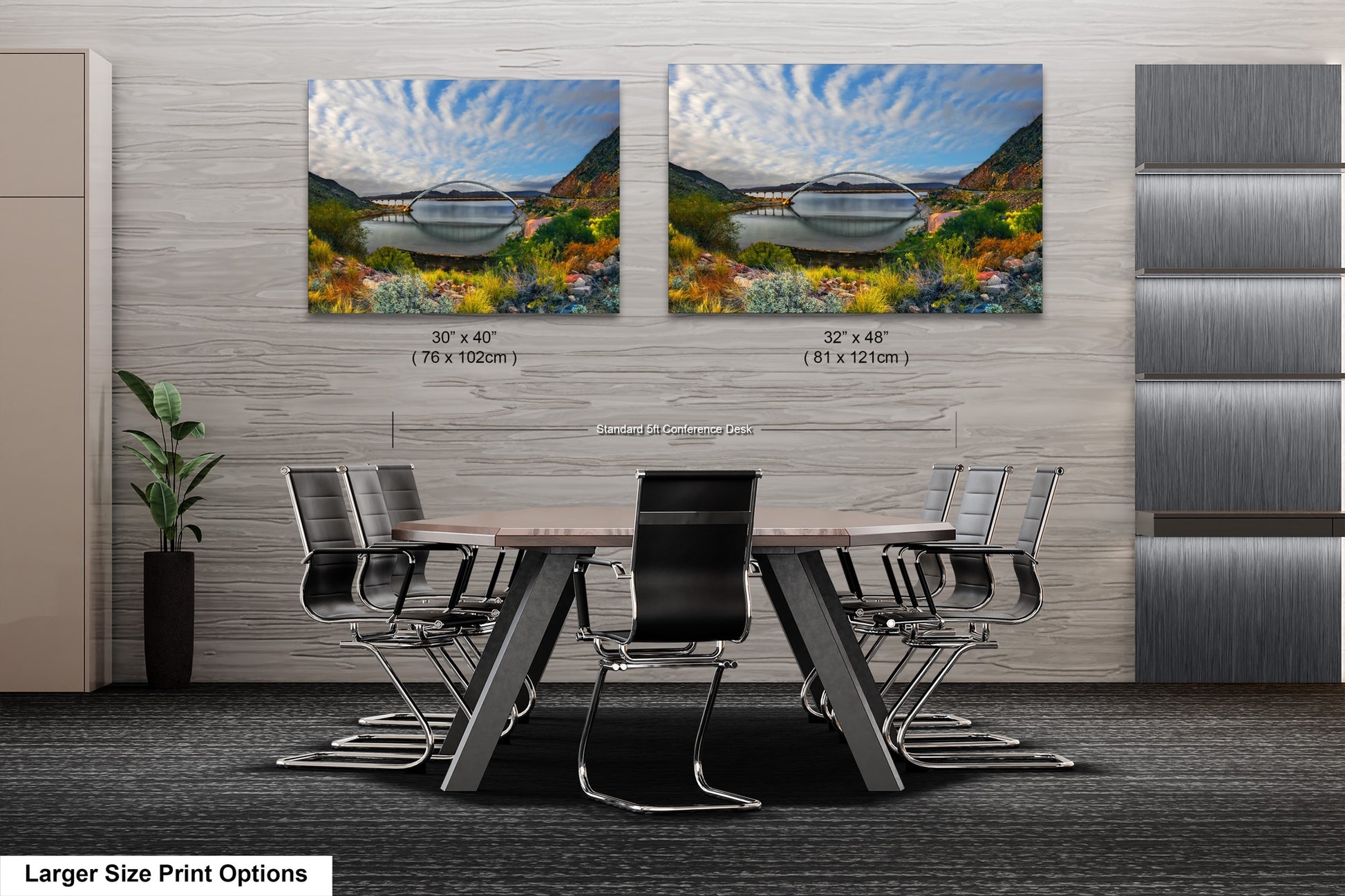 a dining room table with chairs and two pictures on the wall
