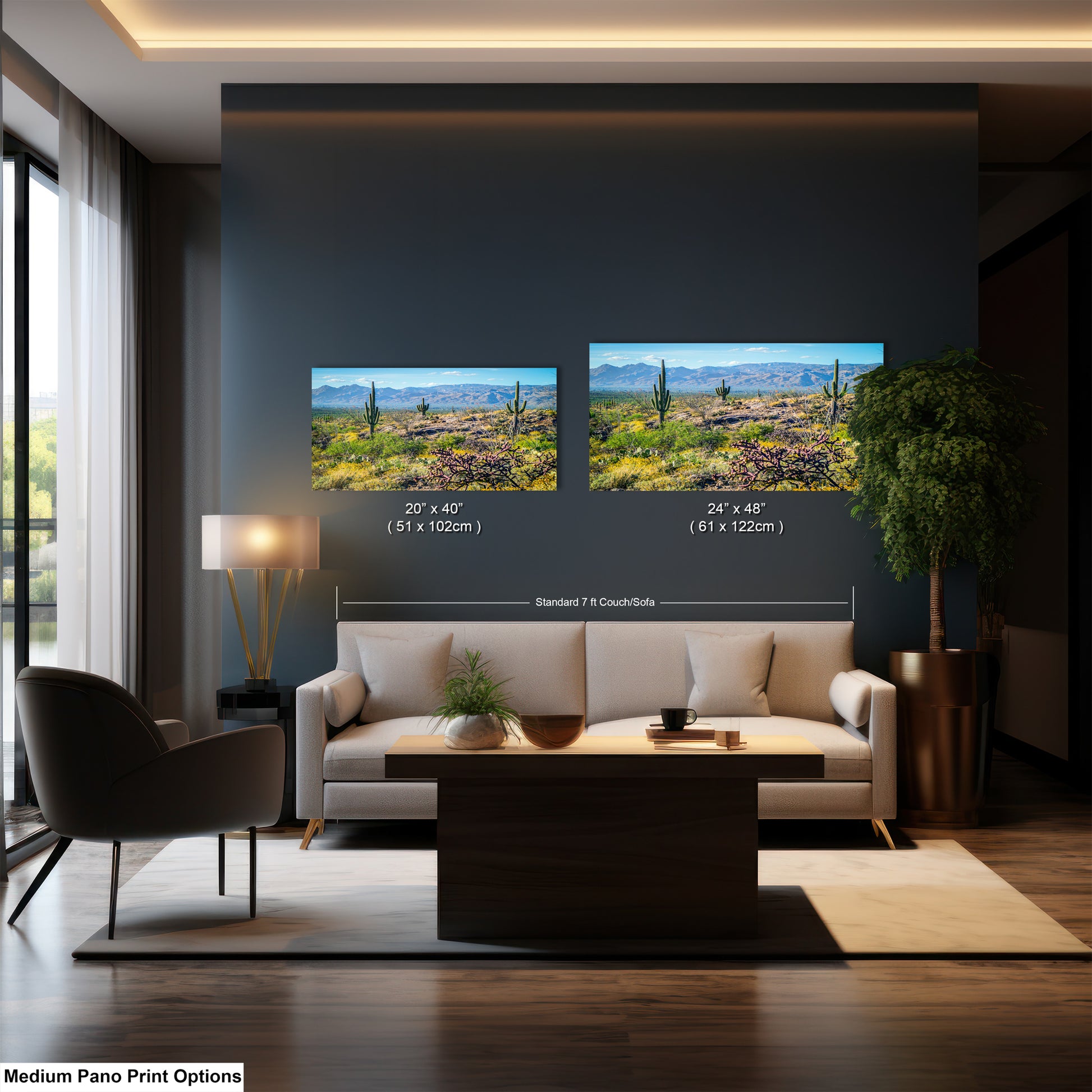 a modern living room with a large wall painting depicting a desert landscape. The painting is framed and hangs above a sofa and coffee table. The sofa is white, and the coffee table is brown. There is also a lamp and a potted plant in the room. The image is described as a medium pano print, and it is a collage of two images.