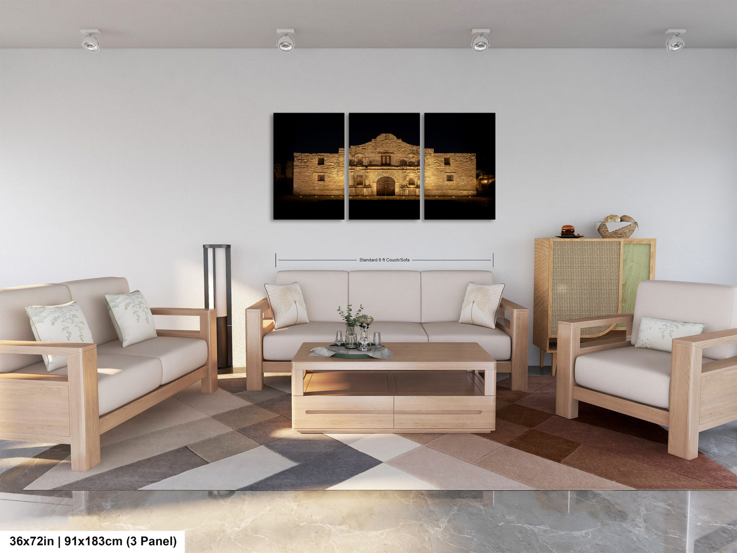 A modern living room with a large, three-panel print of a historic building at night displayed on the wall. The print is framed in a wooden frame and measures 36 inches by 19.83 centimeters, with a total of 9.83 panels. The room is furnished with a sofa, two armchairs, and a coffee table, creating a comfortable and stylish living space.