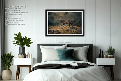 a bedroom with a bed and a picture of a horse on the wall