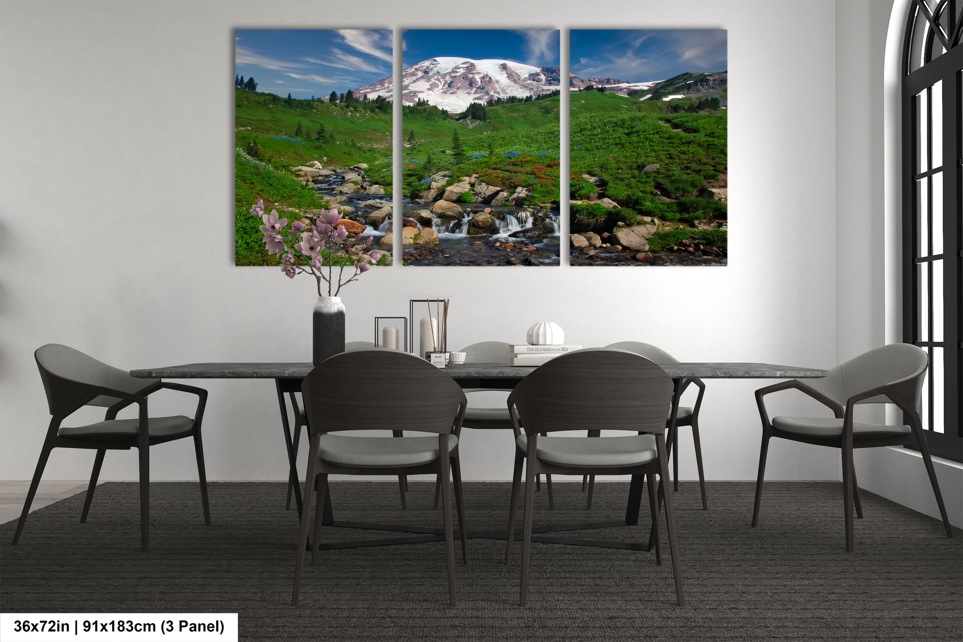 a dining room with a table and chairs