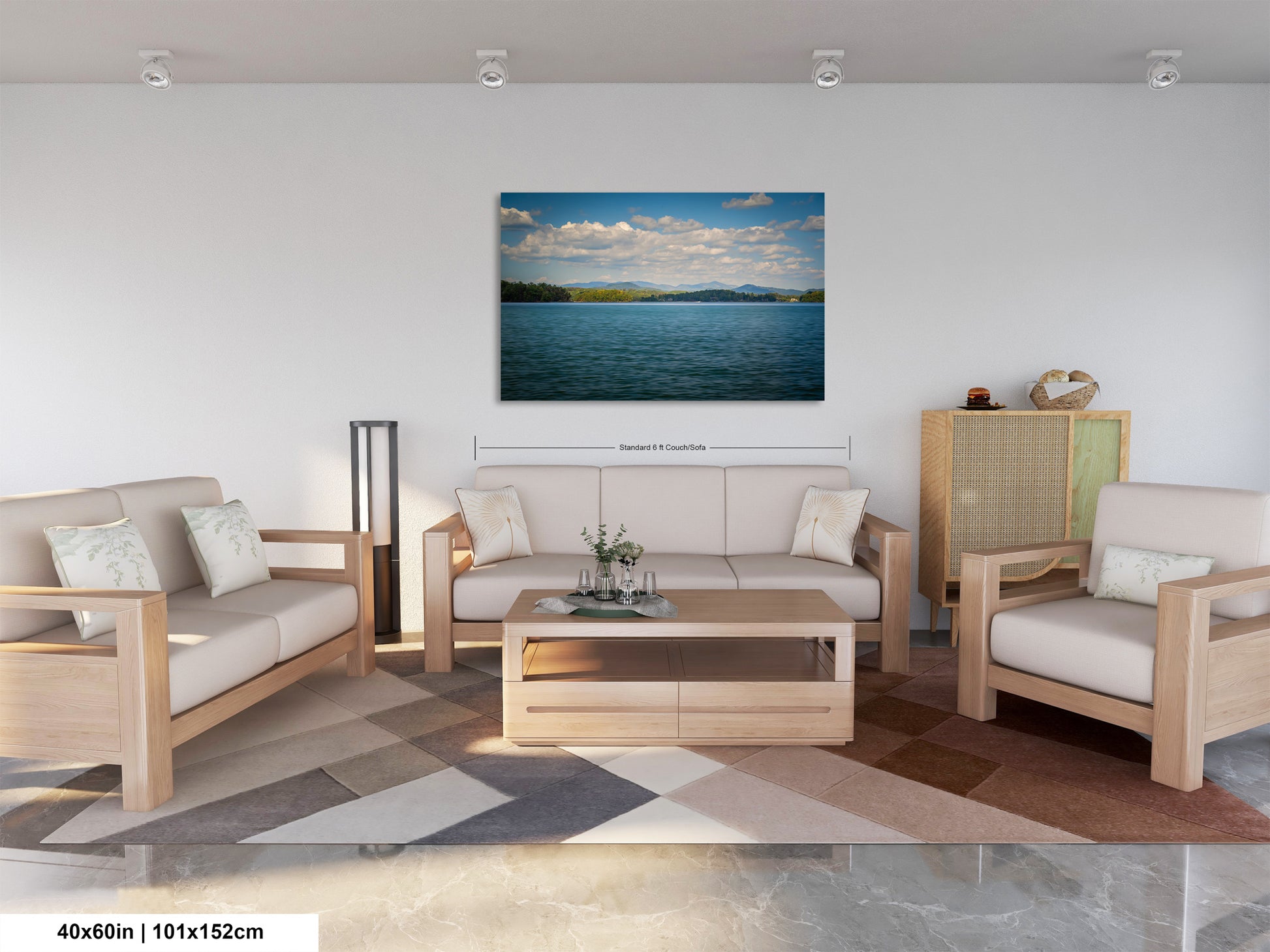 a modern living room with a large painting of a serene lake scene hanging on the wall. The room is furnished with a sofa, two armchairs, and a coffee table, creating a comfortable and inviting atmosphere.