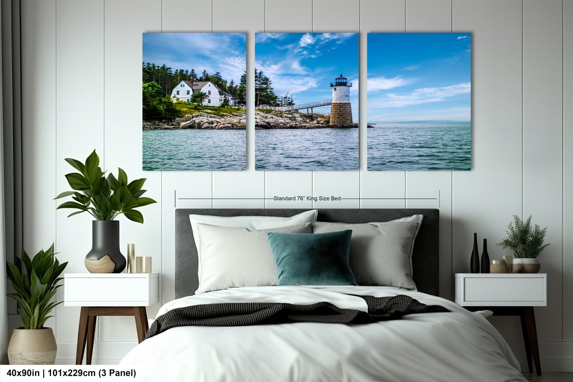 a bedroom with a bed and two paintings on the wall