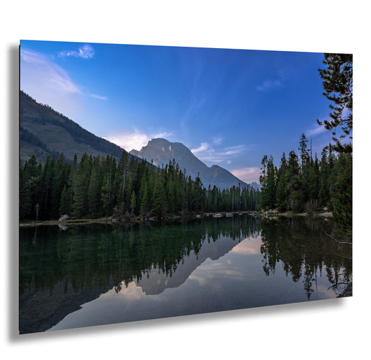 a lake with a mountain in the background