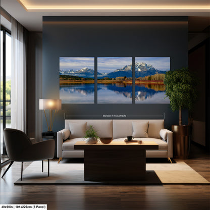 a living room filled with furniture and a painting on the wall