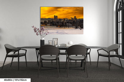a dining room table with chairs and a painting on the wall