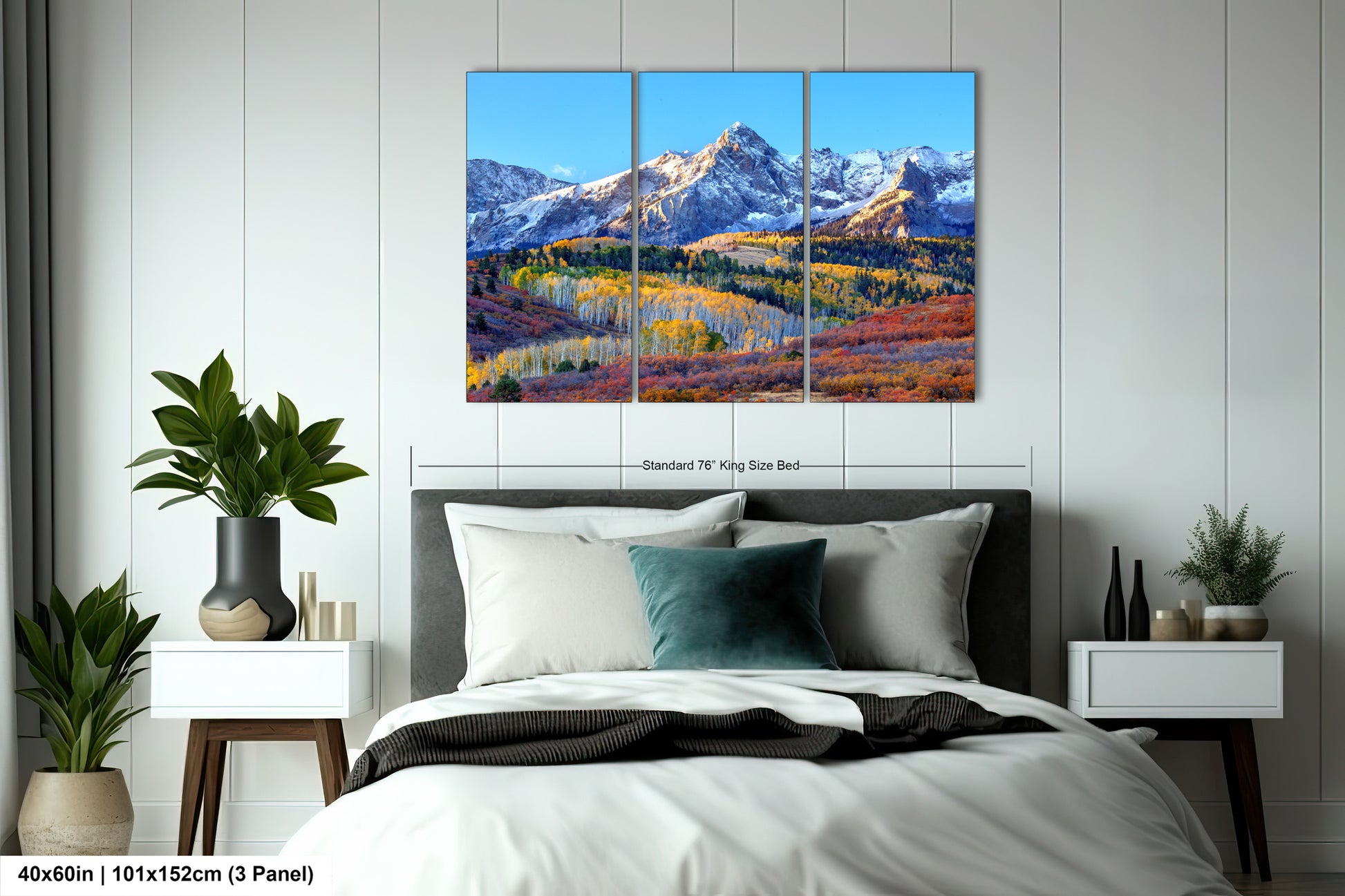 a bedroom scene with a bed and a painting on the wall