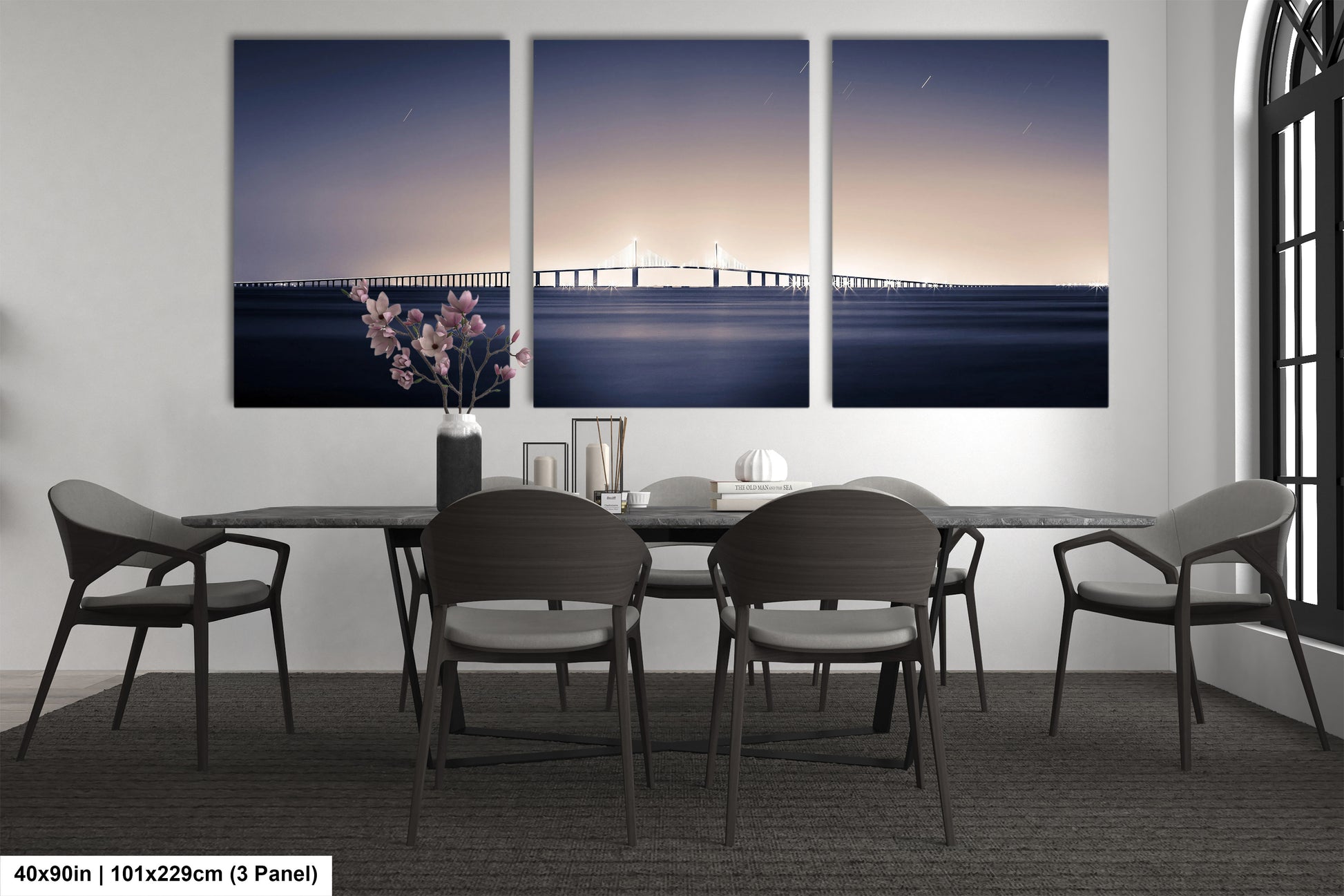 a dining room with a table and four chairs