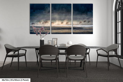 a dining room table with four chairs and a painting on the wall