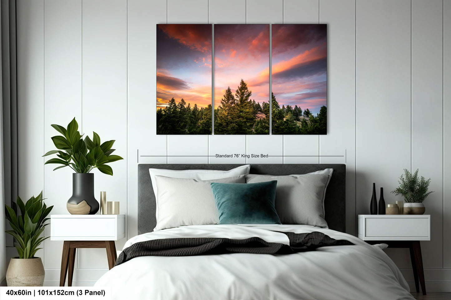 a bedroom with a bed and two paintings on the wall