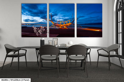 a dining room with a table and four chairs
