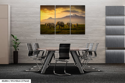 a dining room table with chairs and a painting on the wall