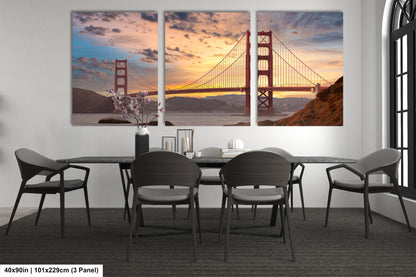 a dining room table with a view of the golden gate bridge