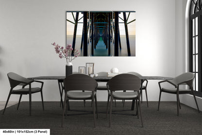 a room with a table and chairs and a painting on the wall