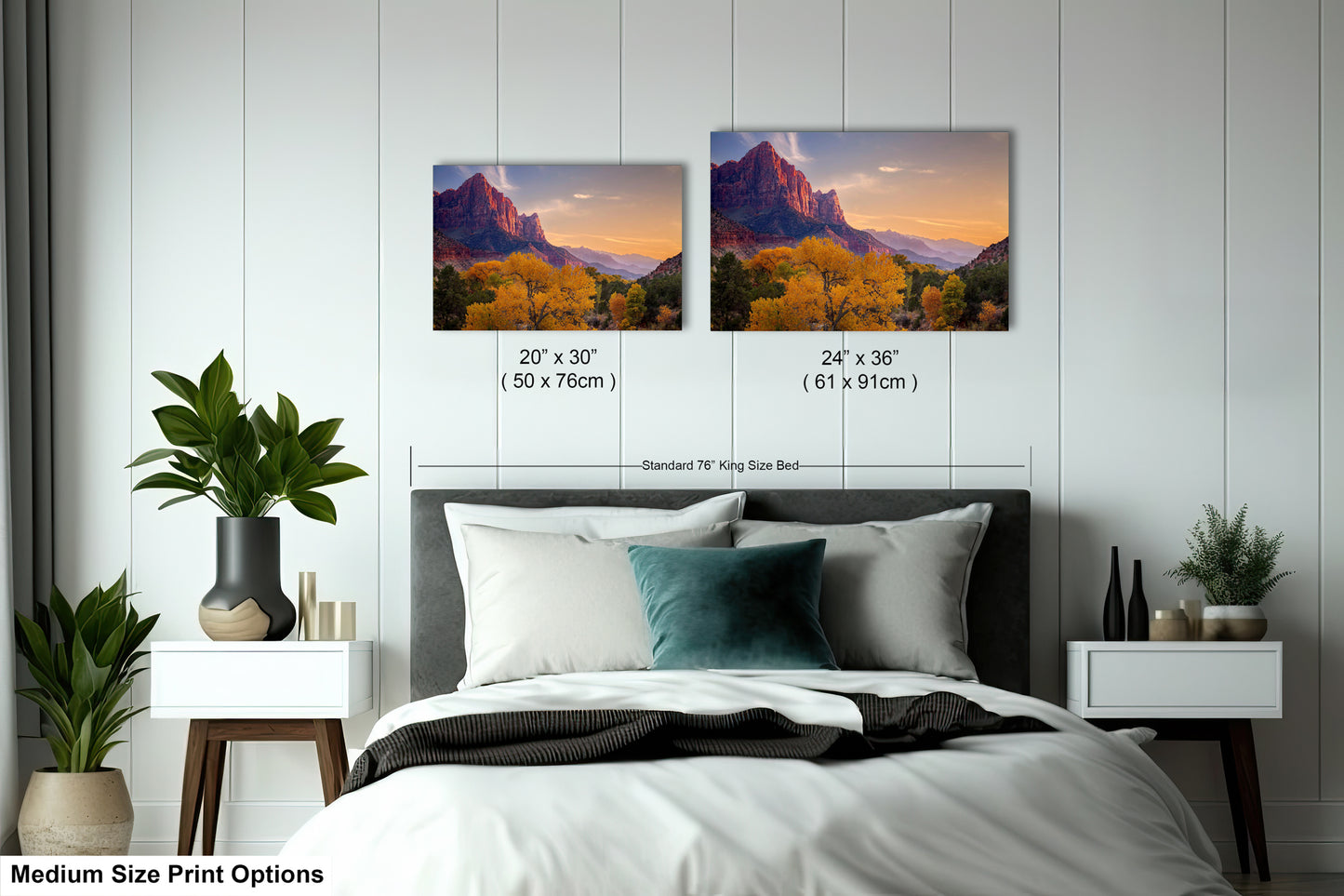 a bedroom with a bed and two pictures on the wall