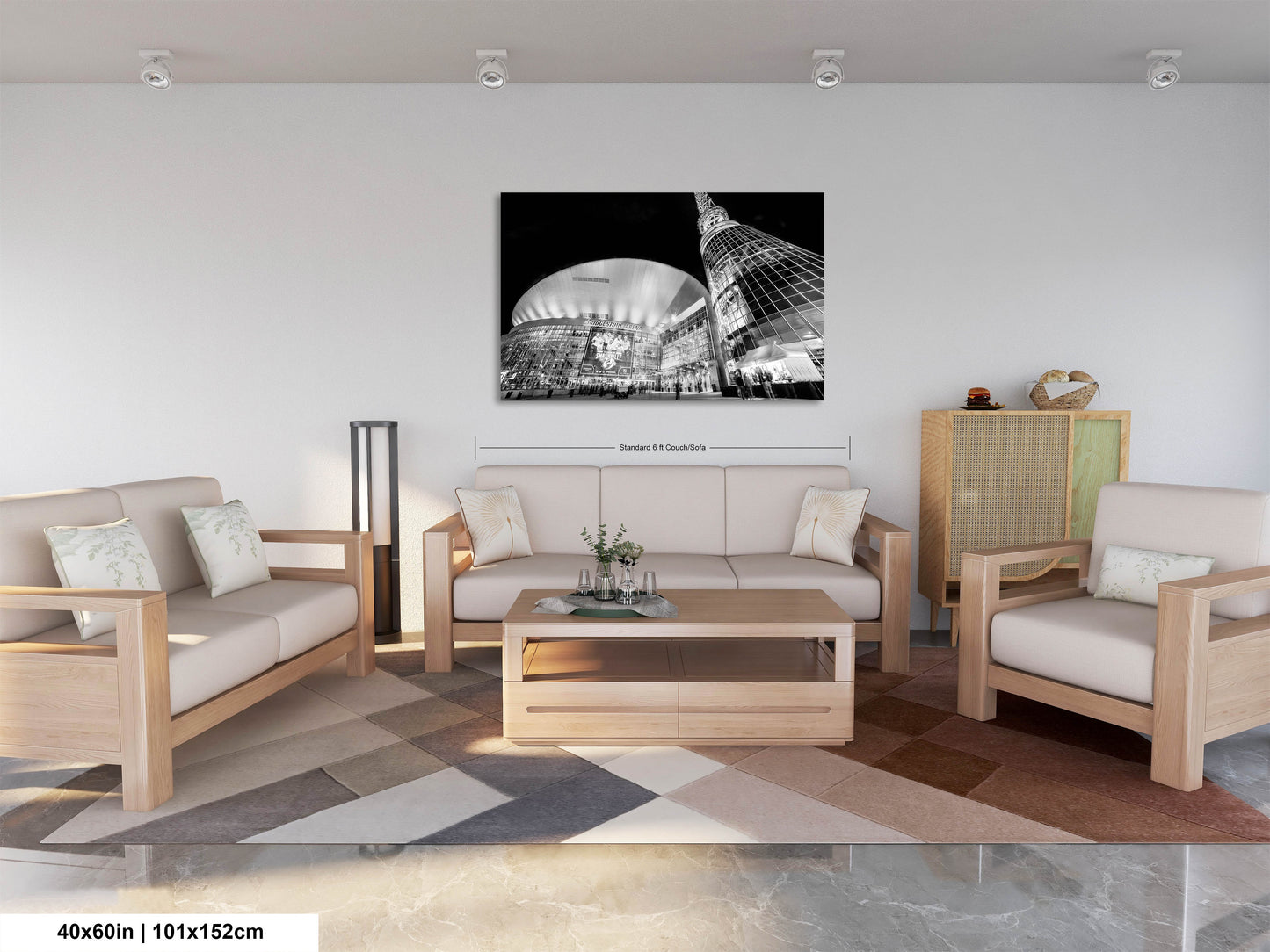 a living room filled with furniture and a painting on the wall