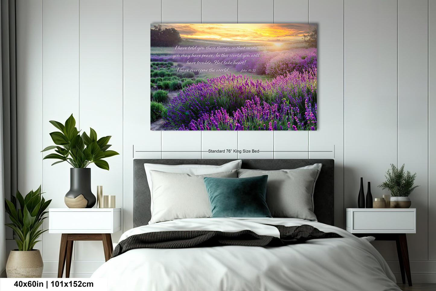 a bed room with a neatly made bed and a painting on the wall