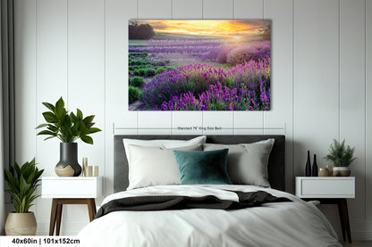 a bed room with a neatly made bed and a painting on the wall