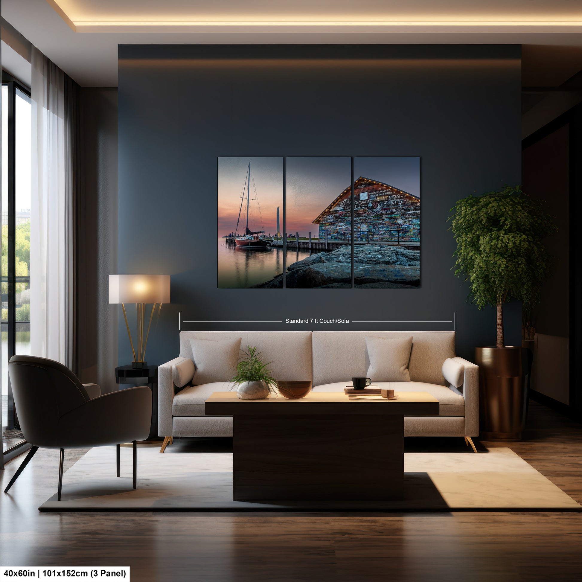 The image is a modern living room with a large window, a white sofa, a wooden coffee table, and a painting of a boat on a dock.