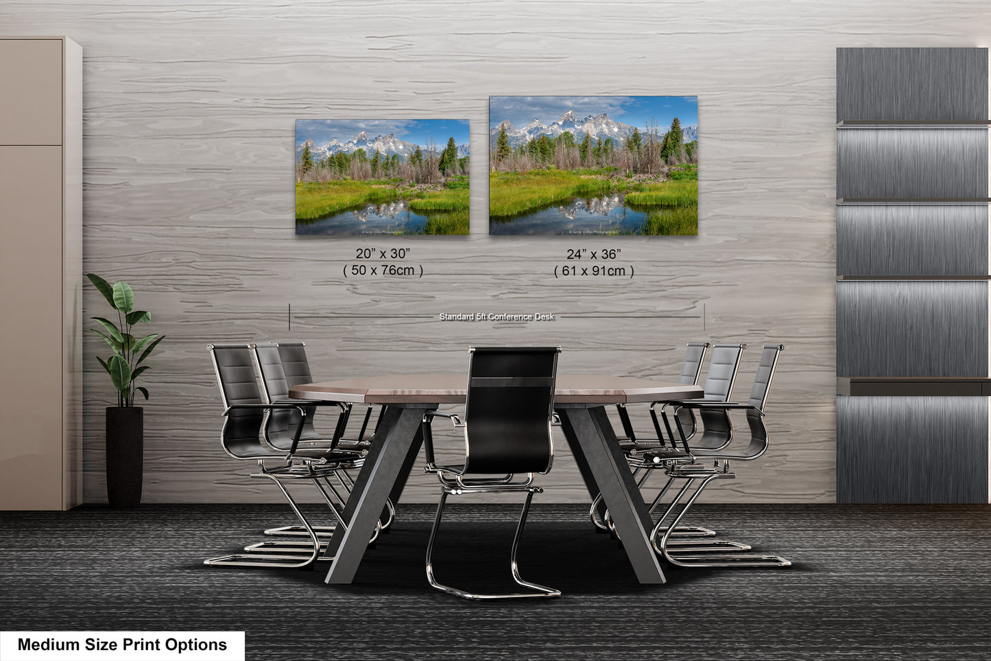 a dining room table with chairs next to a wall with a picture of a forest