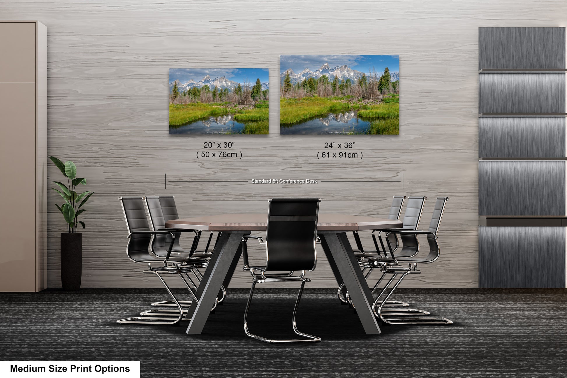 a dining room table with chairs next to a wall with a picture of a forest
