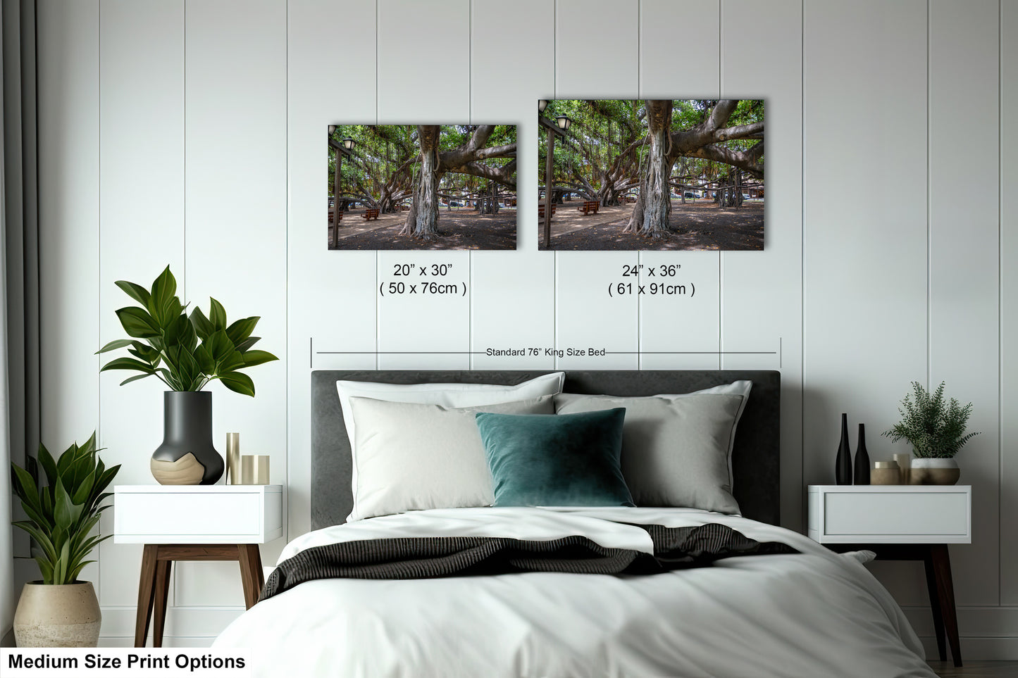 a bedroom with a bed and two pictures on the wall