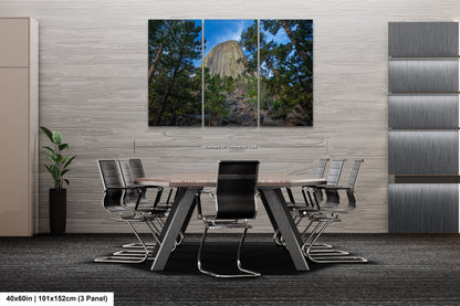 a dining room with a table and chairs