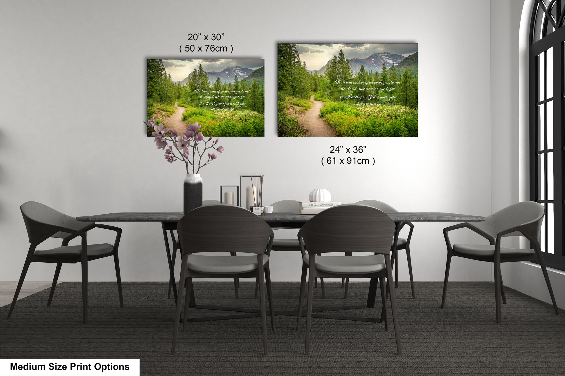 a dining room table with four chairs and a vase of flowers