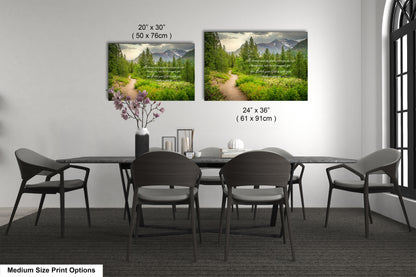 a dining room table with four chairs and a vase of flowers