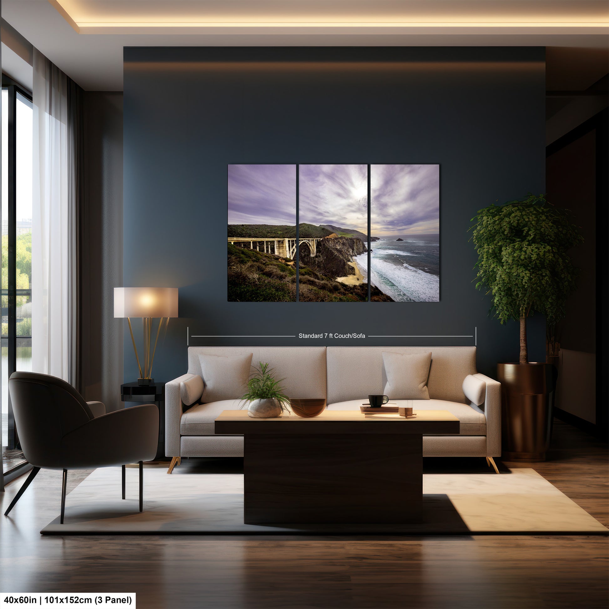 a living room with a couch a table and a painting on the wall