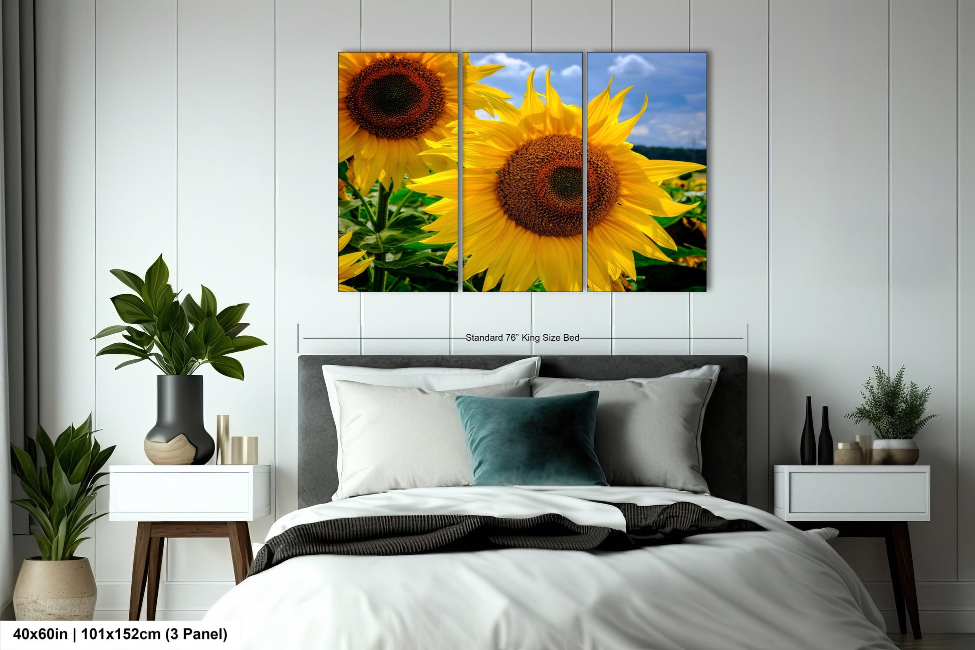 a bedroom with a bed and two sunflowers on the wall