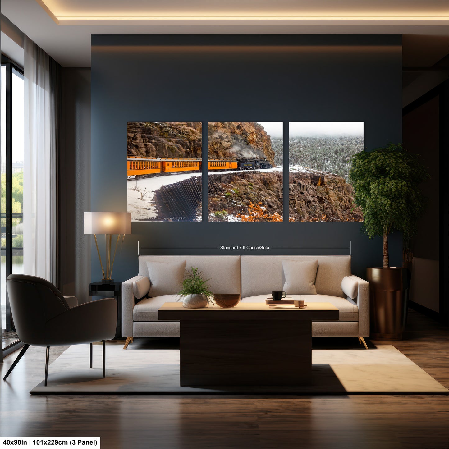 a living room with a couch a table and a window