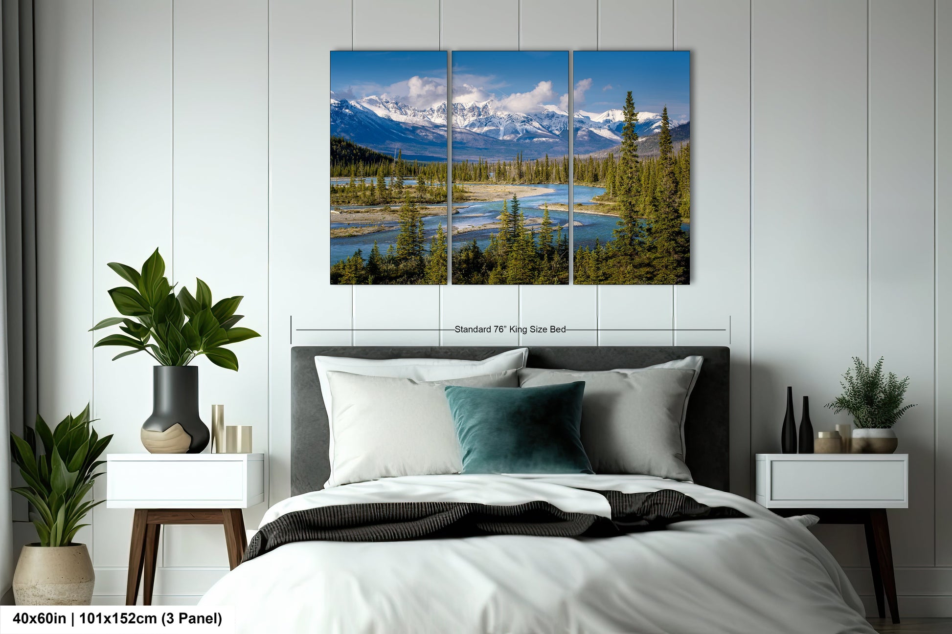 a bedroom with a large bed and a mountain view