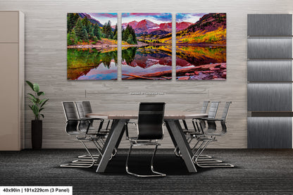 a dining room table with chairs and a painting on the wall