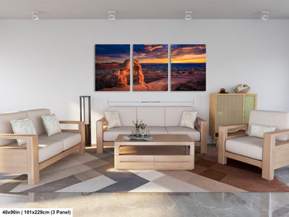 a living room filled with furniture and a painting on the wall