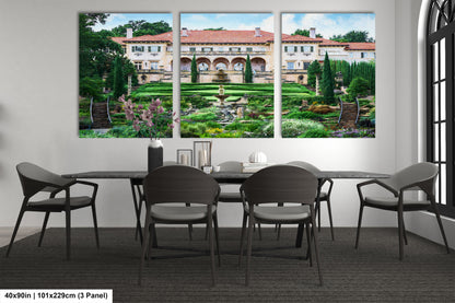 a dining room with a table and chairs