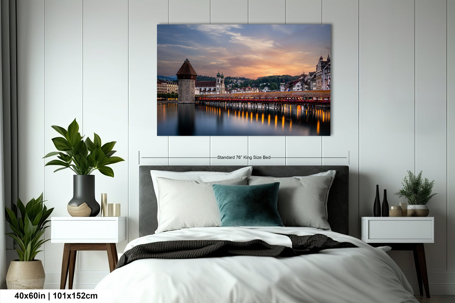 a bedroom with a large bed and a painting on the wall