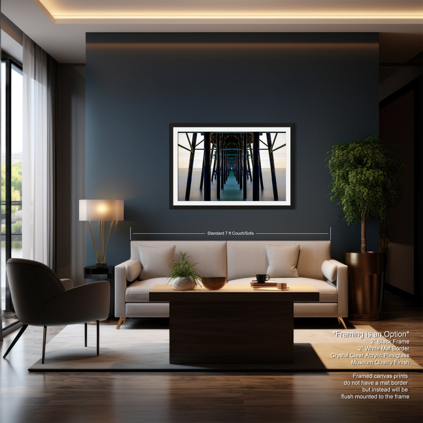 a living room with a couch a chair and a painting on the wall